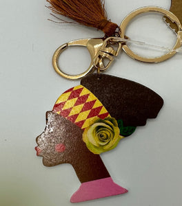 Gold Keychain with Black Girl in Multi Colored Head Band and Brown Tassel