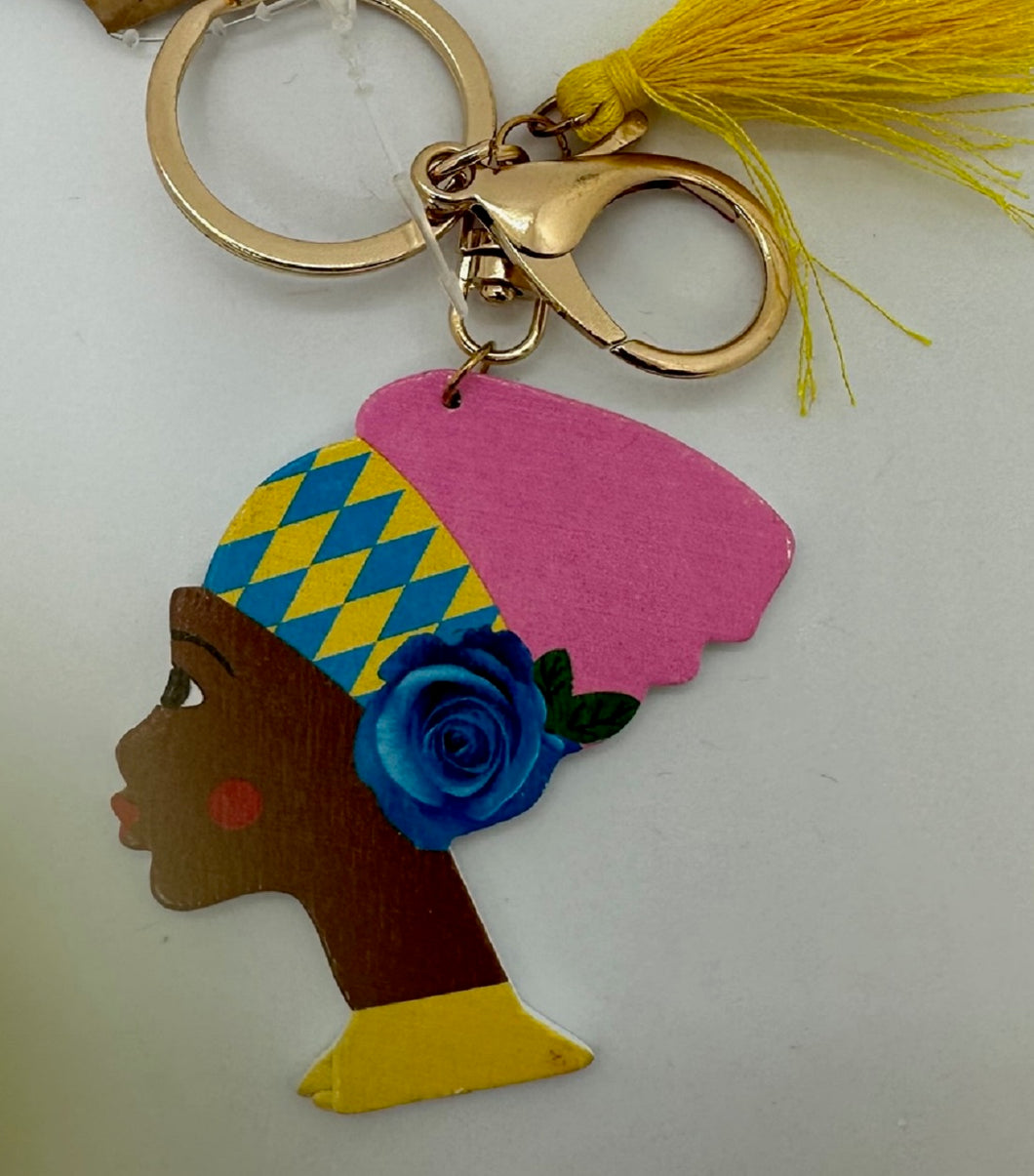 Gold Keychain with Black Girl in Multi Colored Head Band and Yellow Tassel