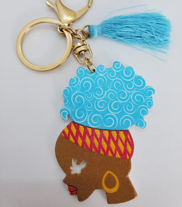 Gold Keychain with Black Girl in Multi Colored Head Band Ponytail Blue Tassel