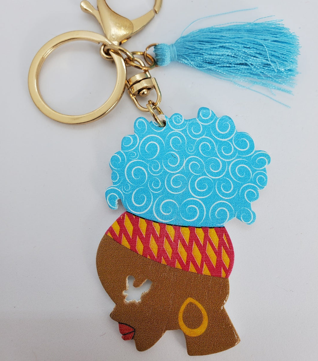 Gold Keychain with Black Girl in Multi Colored Head Band Ponytail Blue Tassel
