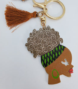Gold Keychain with Black Girl in Multi Colored Head Band Ponytail Brown Tassel