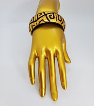 Load image into Gallery viewer, Metallic Gold and Black Bangle Bracelet with Ethnic Design
